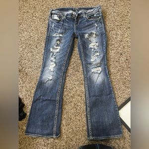 Distressed silver women’s jeans